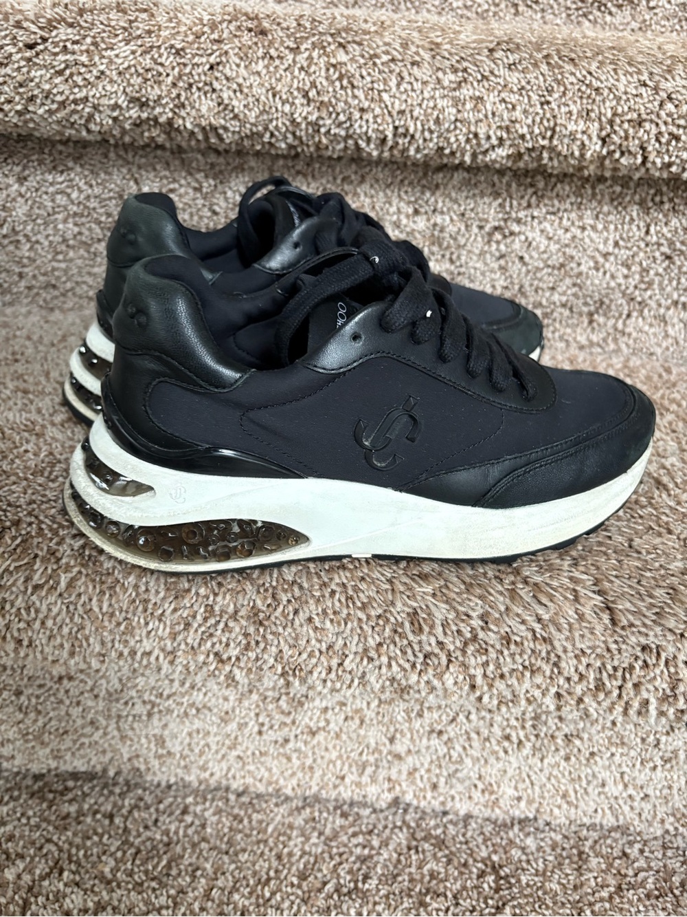 Jimmy Choo Memphis Women’s Black and White Trim Leather Sneakers .